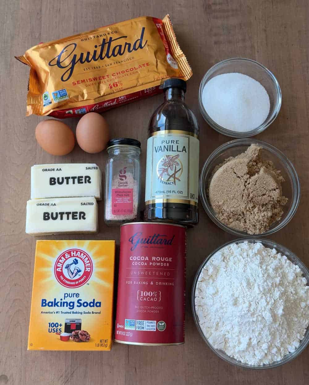 flour, cocoa powder, chocolate chips and ingredients for cookies.