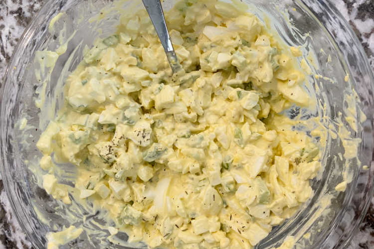 https://www.meatloafandmelodrama.com/wp-content/uploads/2021/03/simple-egg-salad-recipe-in-mixing-bowl.jpeg
