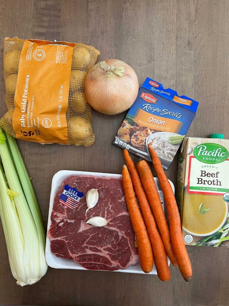 https://www.meatloafandmelodrama.com/wp-content/uploads/2023/08/slow-cooker-pot-roast-with-onion-soup-mix-ingredients-767x1024.jpeg