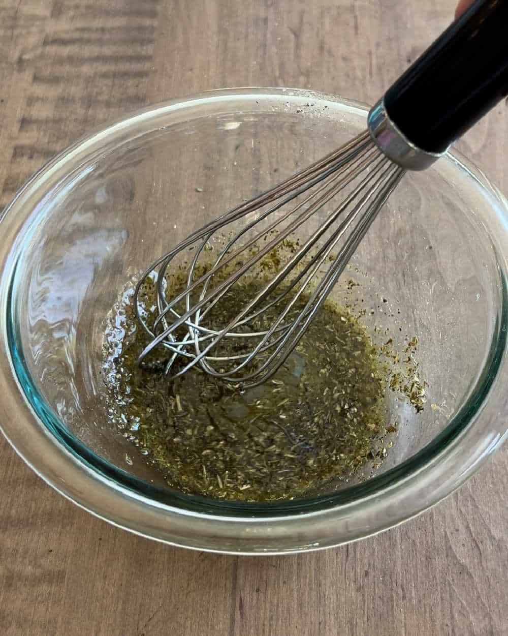 whisk dressing ingredients in small bowl.