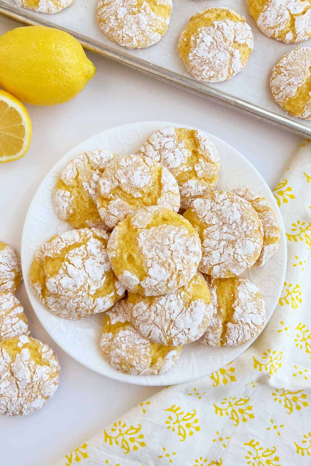 plate of lemon cake mix cookies on the table.