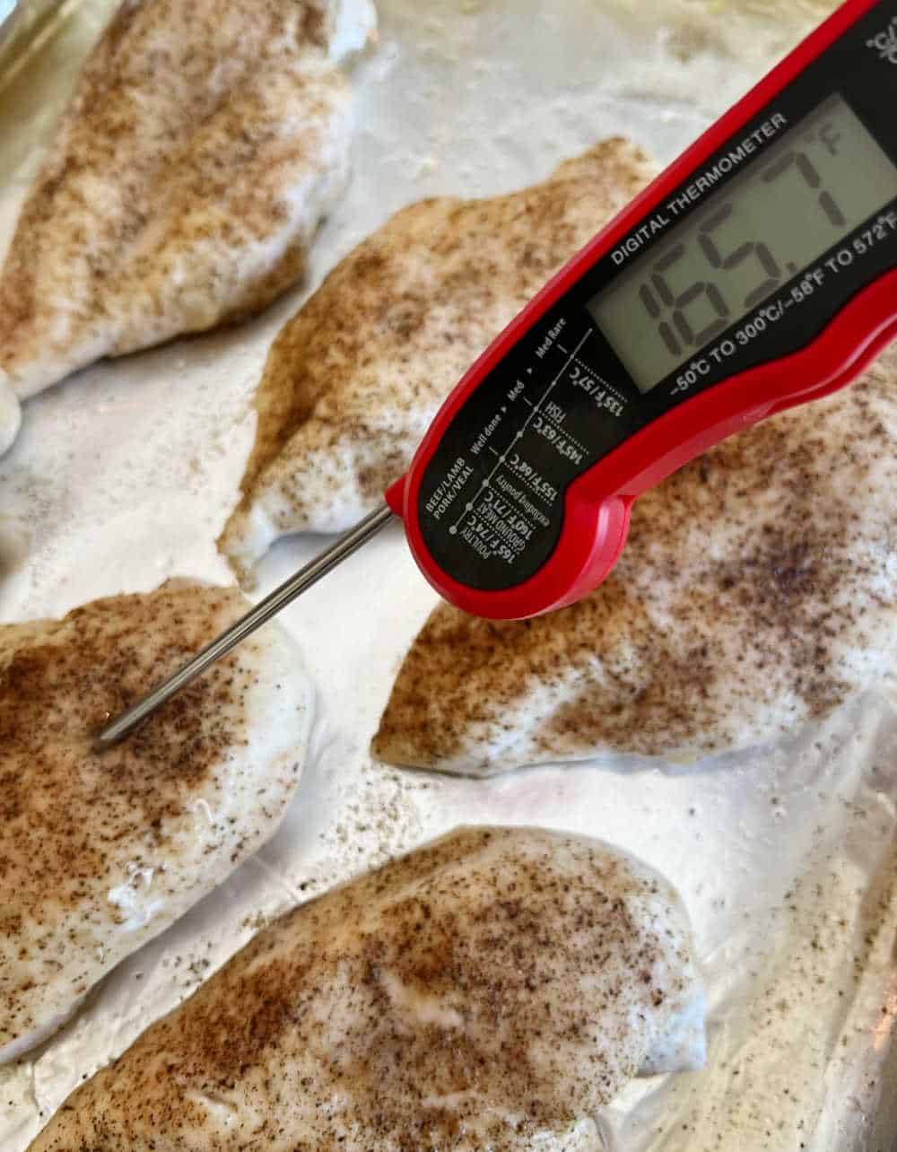 check internal temperature of cooked chicken.
