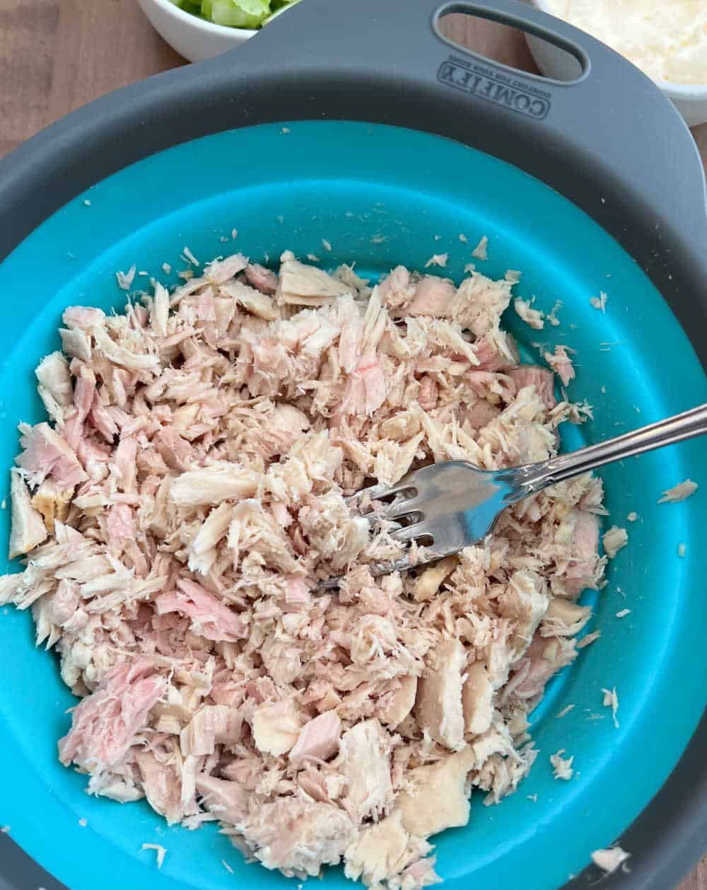 fork in flaked tuna.