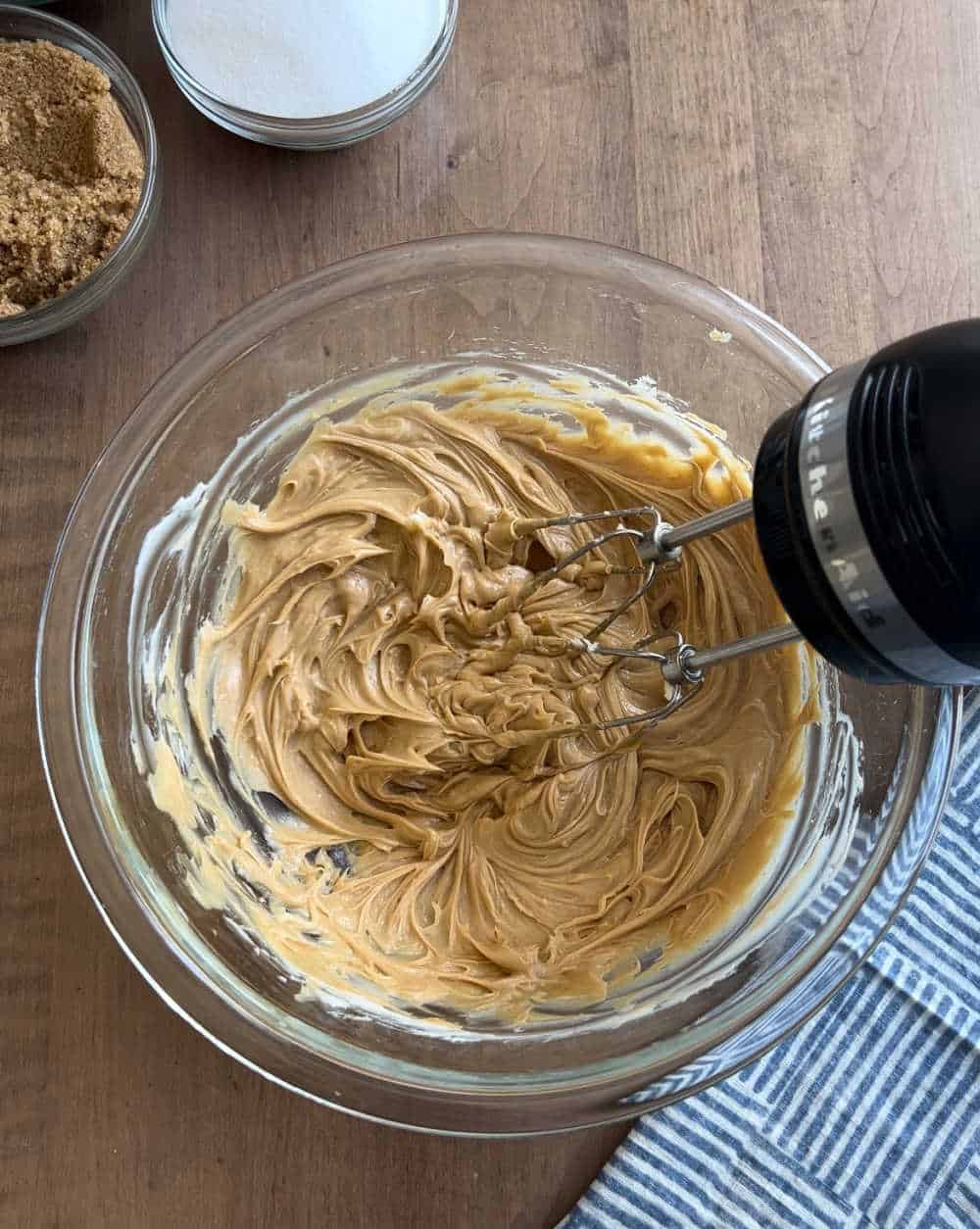 cream butter and peanut butter in mixing bowl.