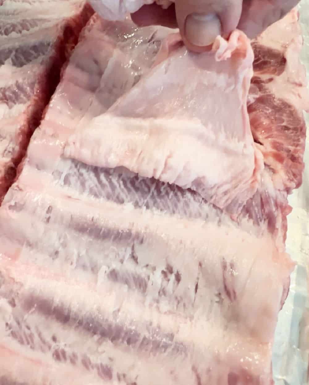 pull membrane from ribs.