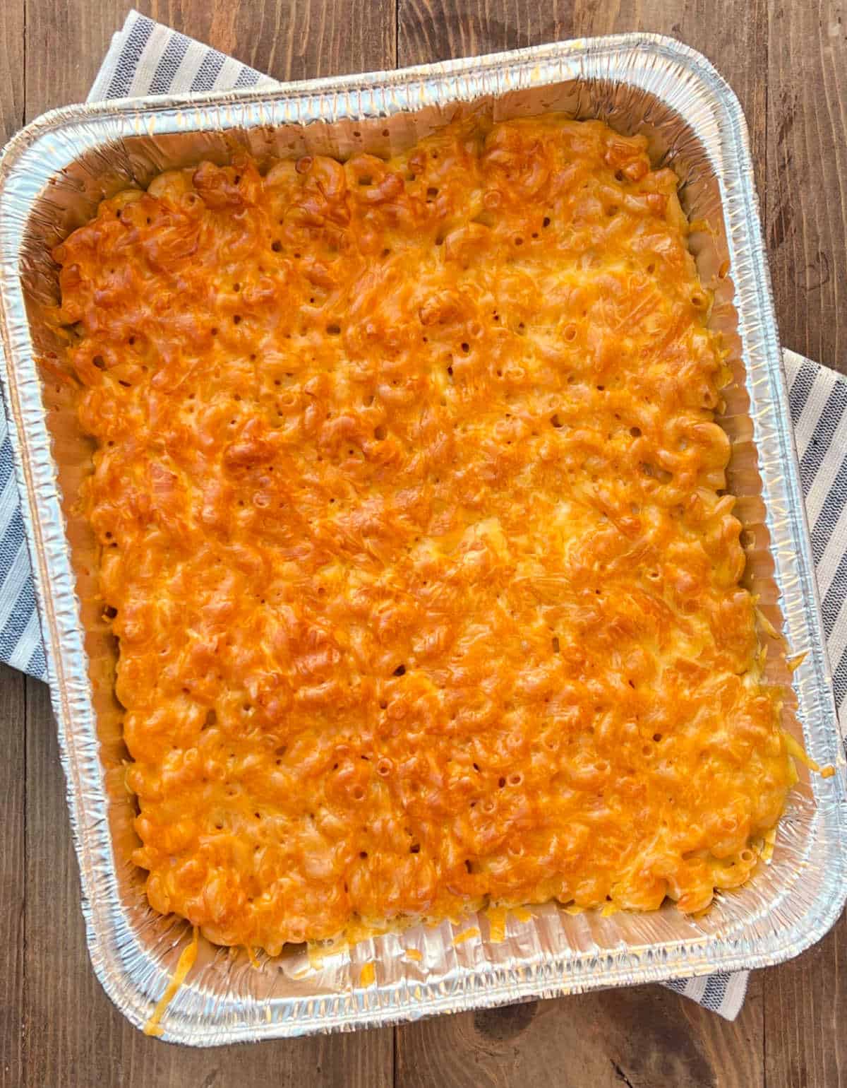 pan of smoked mac and cheese with cheesy crust.