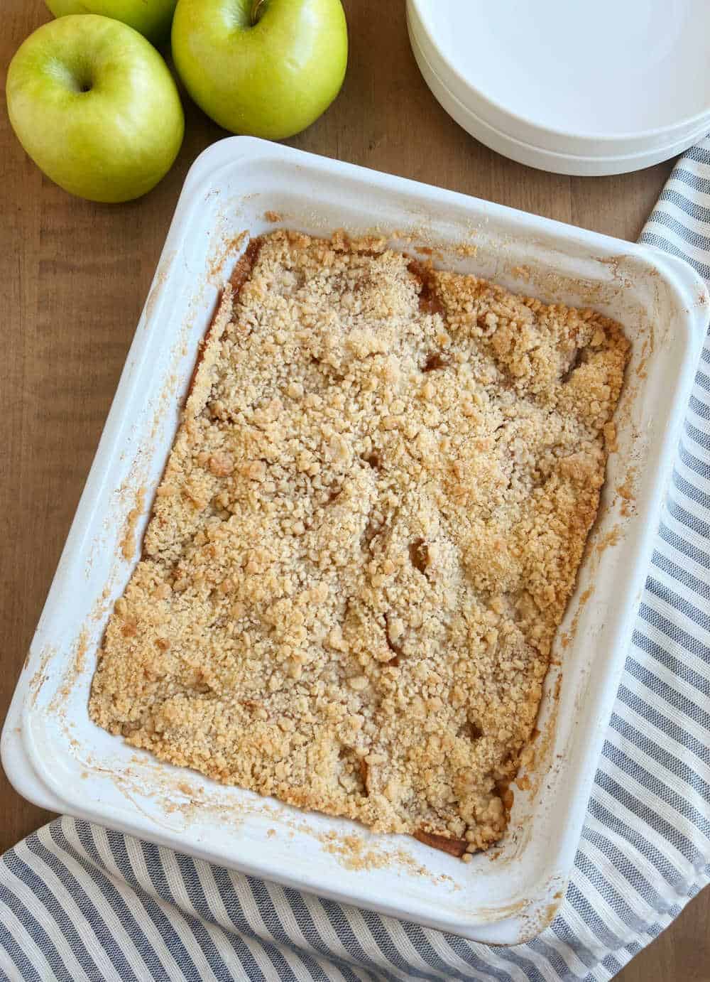 Warm apple crisp in baking dish.