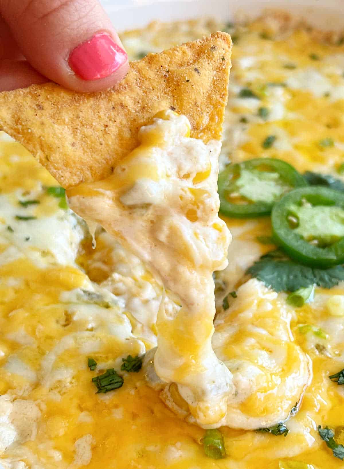 cheesy corn dip on corn chip.