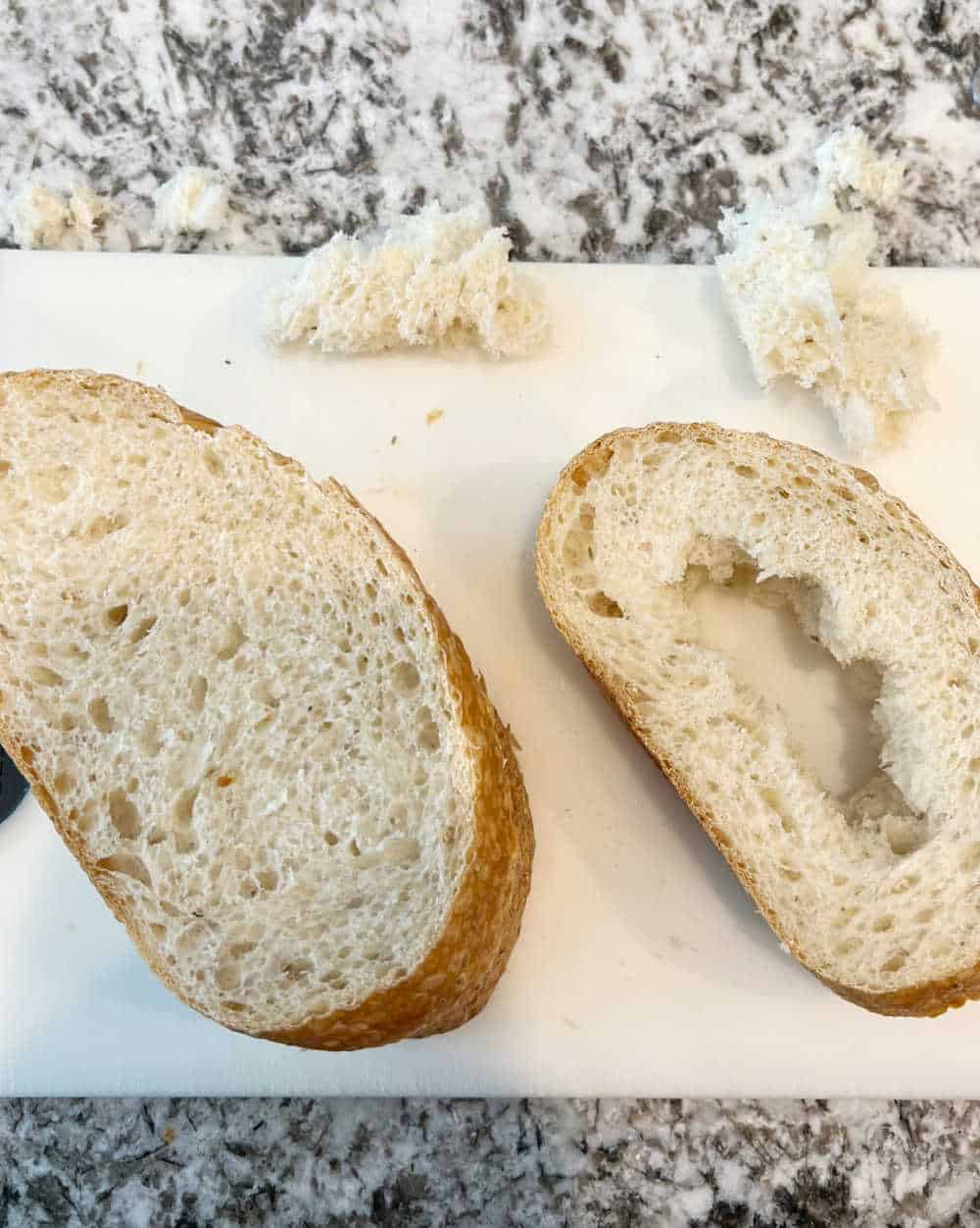 tear middle out of bread slices.