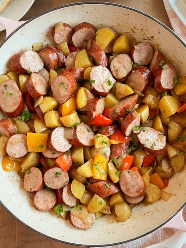 fried kielbasa with potatoes and peppers.