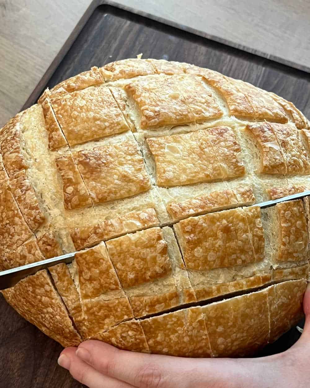 slice bread loaf with knife.