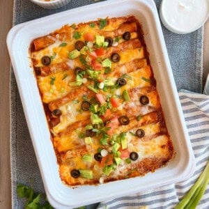 ground beef enchiladas in baking dish.