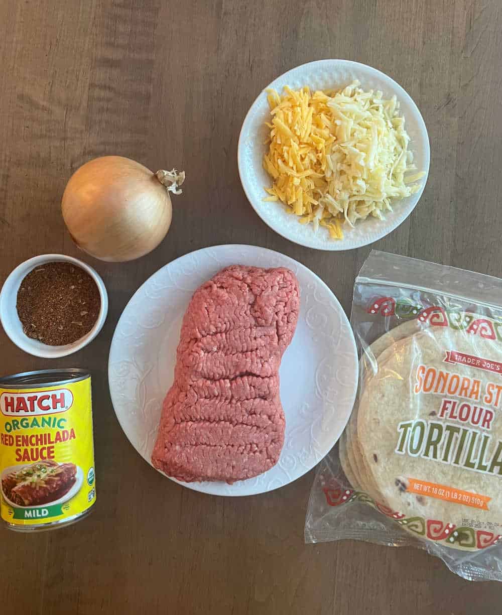 ground beef, taco seasoning, red sauce, onion, cheese, flour tortillas.