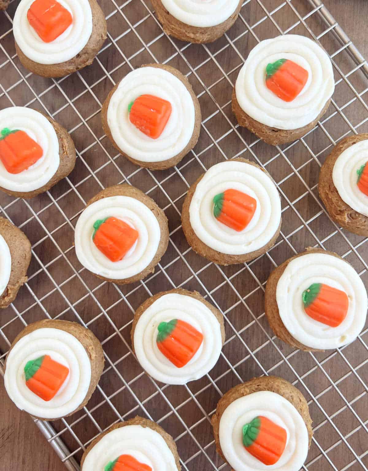 pumpkin cookies with cream cheese frosting and marshmallow pumpkins.