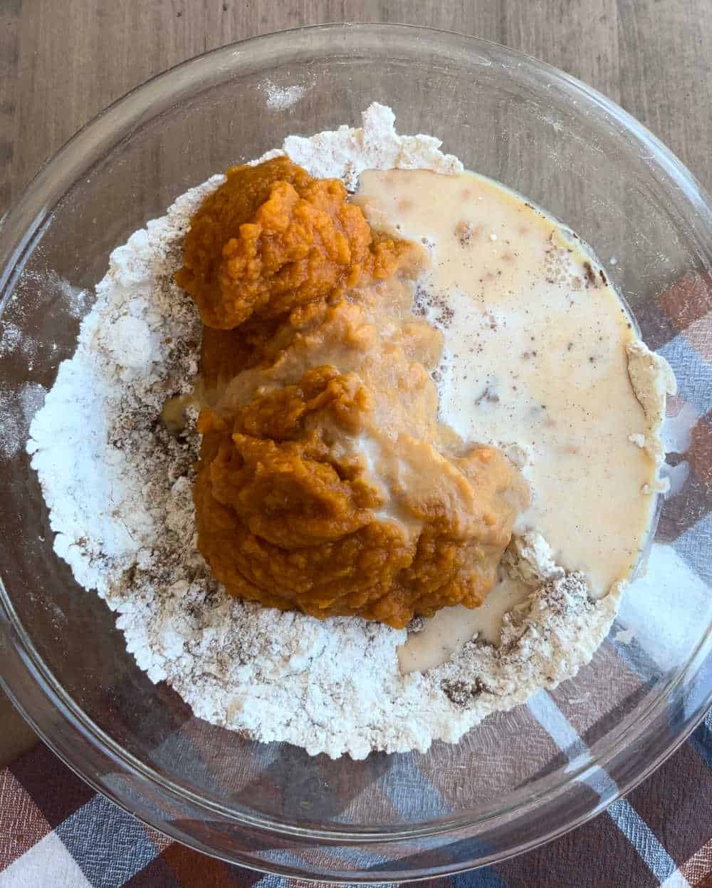 pumpkin puree and dry ingredients in mixing bowl.