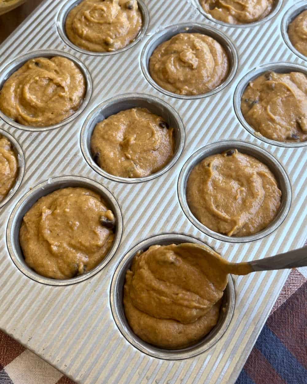 spoon batter into muffin pan.