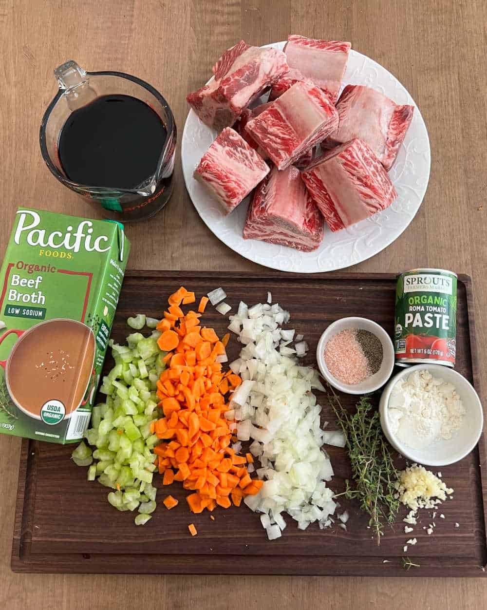 short ribs, broth, wine, carrots, celery, onion, tomato paste, flour and seasonings.