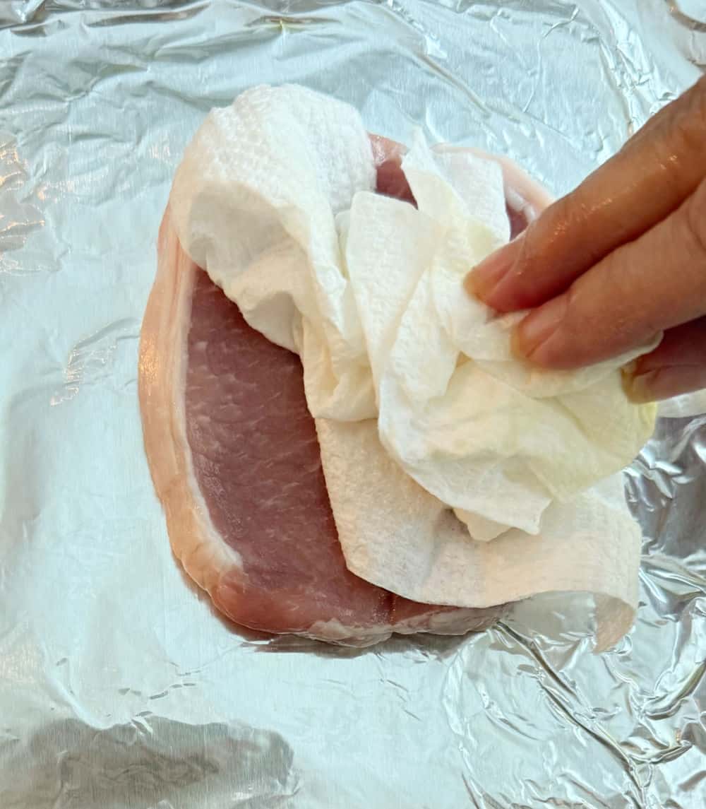 pat pork dry with paper towel.