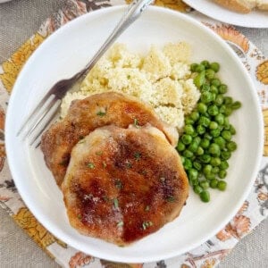 baked brown sugar pork chops on plate.