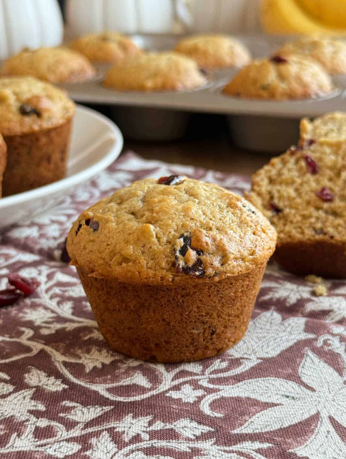 easy banana cranberry muffins on the table.