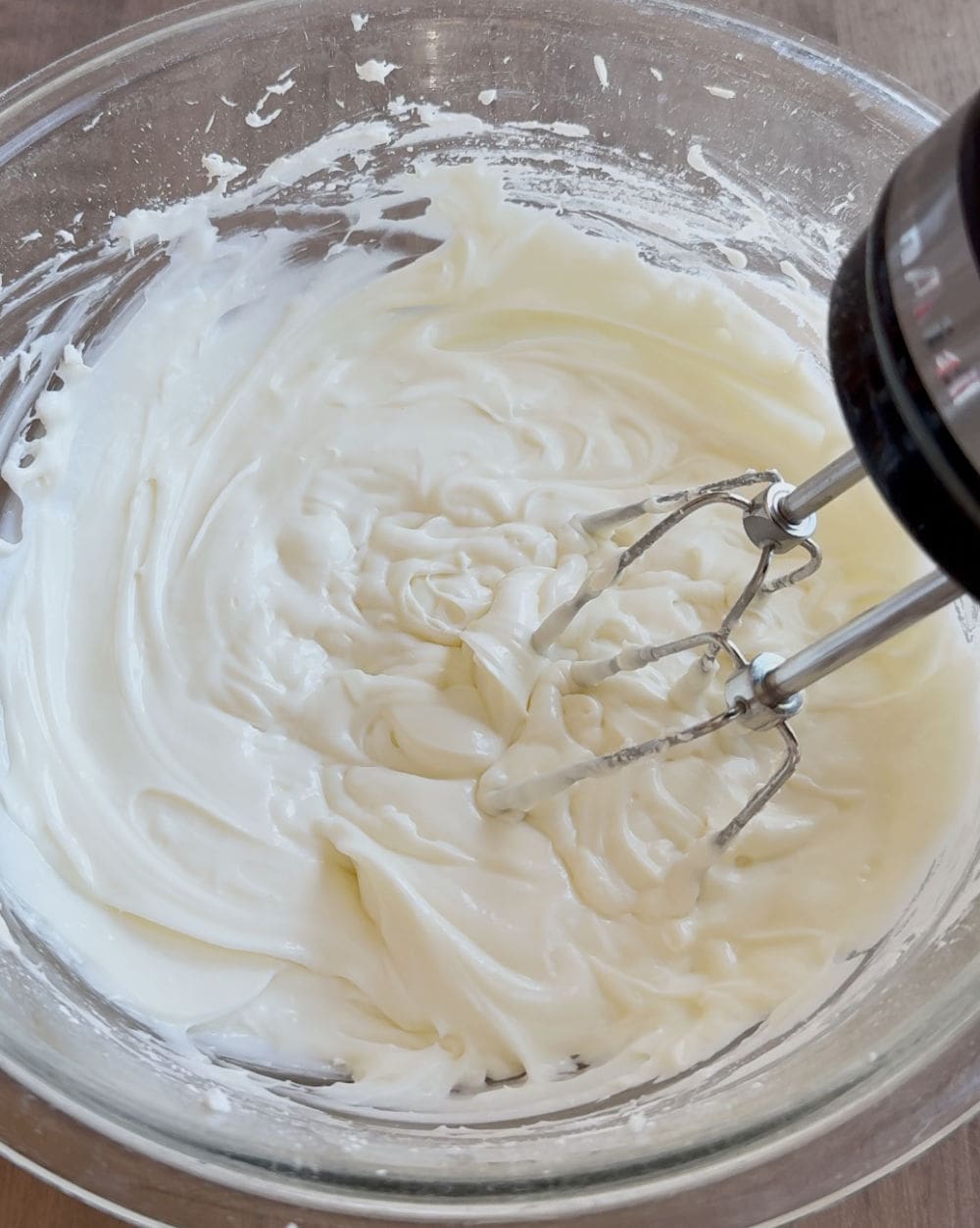 mix cream cheese layer with hand mixer.