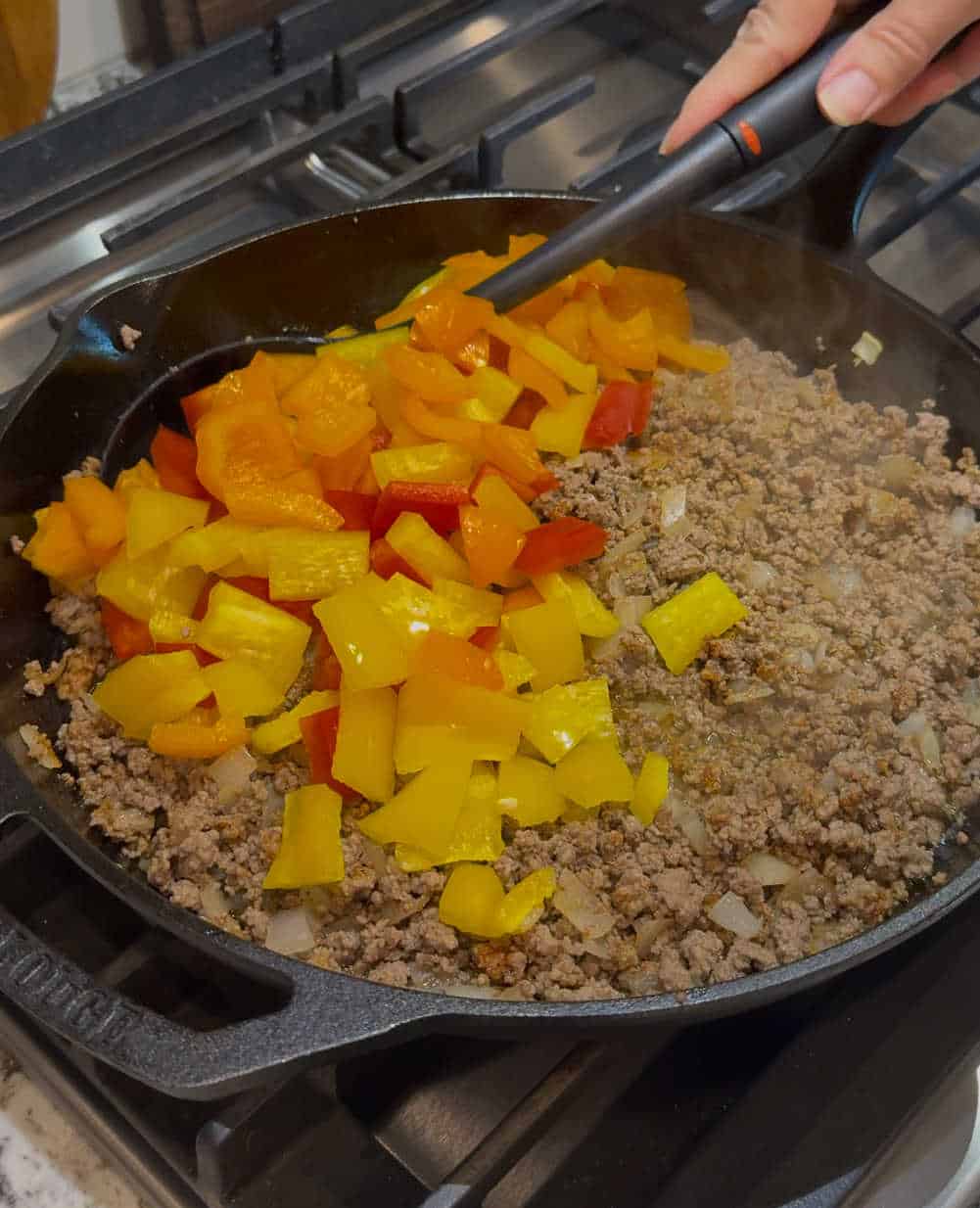 stir peppers in skillet.