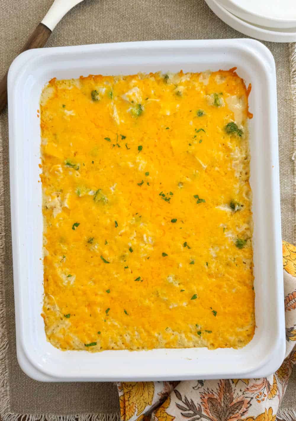 cheesy chicken broccoli rice casserole in baking pan.