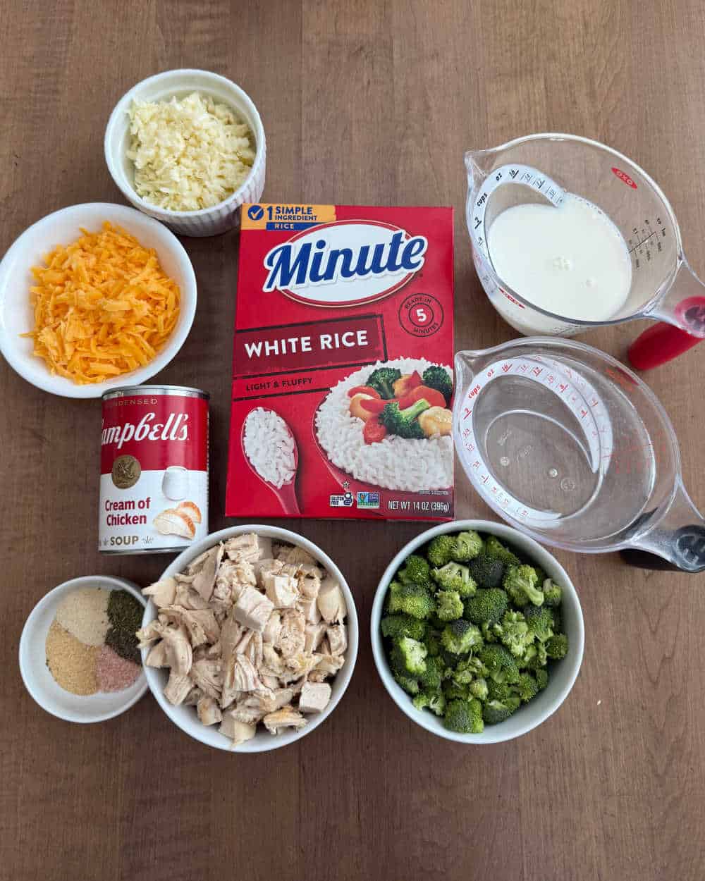 cooked chicken, minute rice, broccoli and ingredients for casserole.