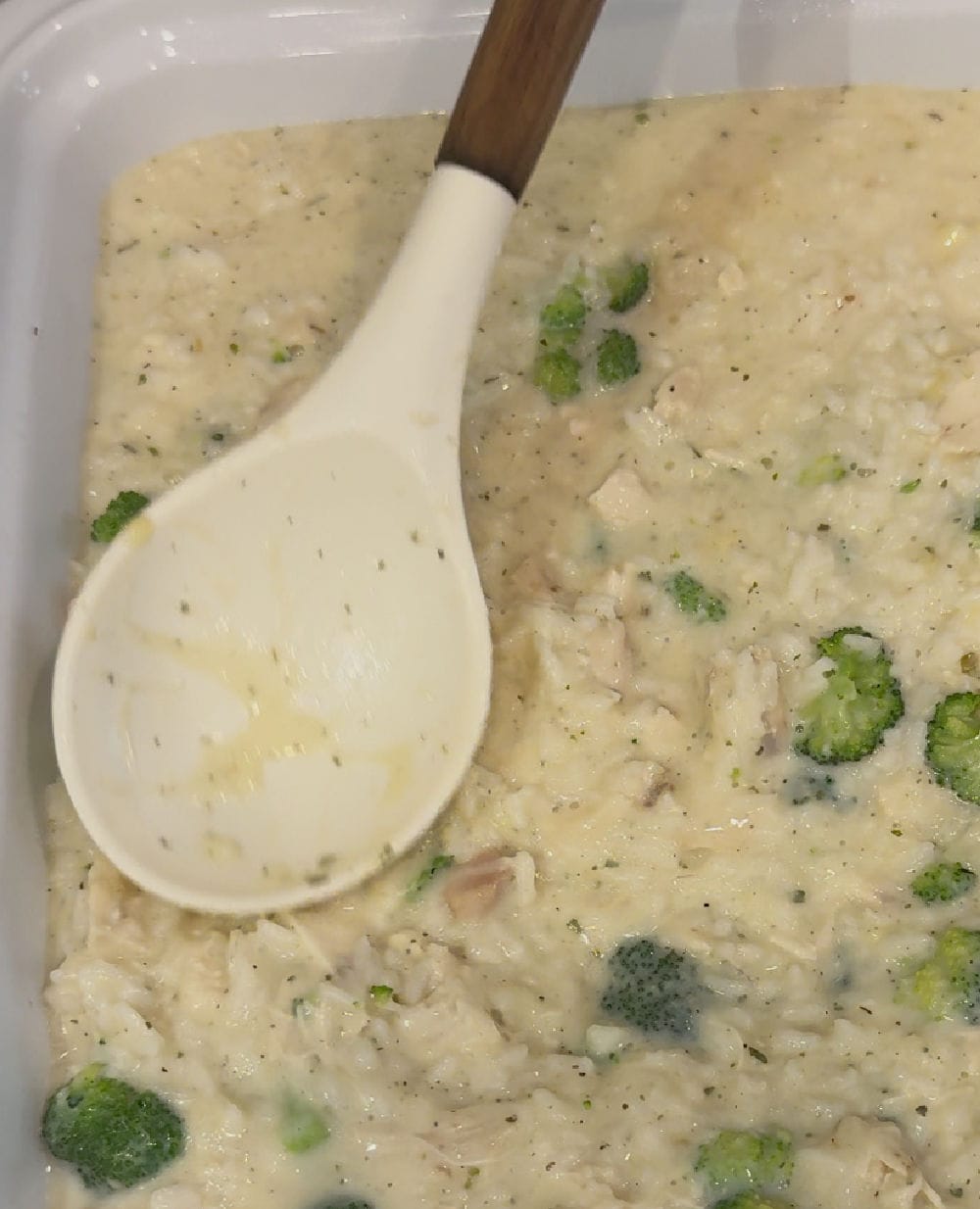 spread casserole in baking dish with spoon.