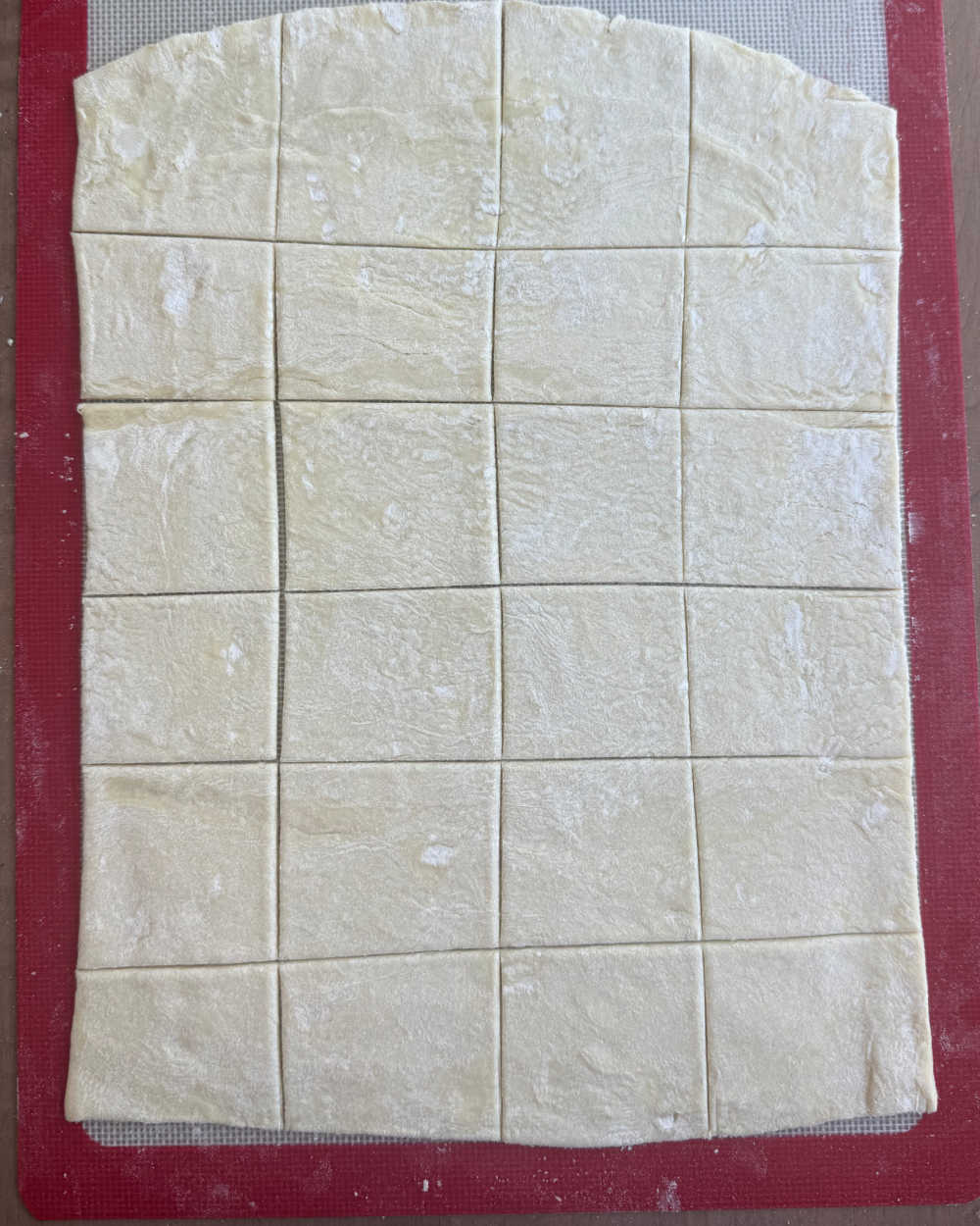 sheet of puff pastry sliced squares.