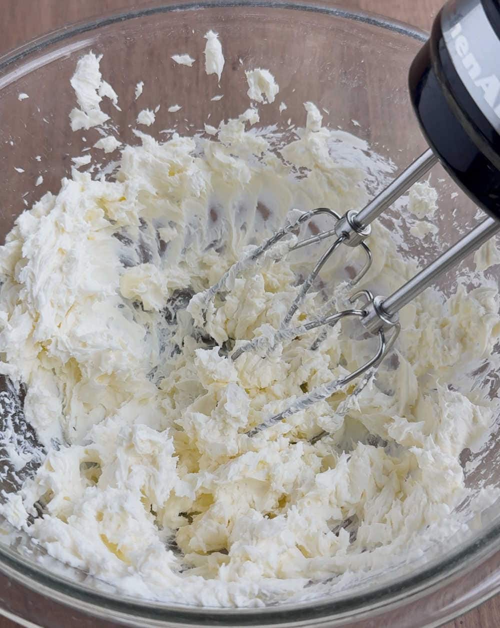 whip cream cheese with mixer.