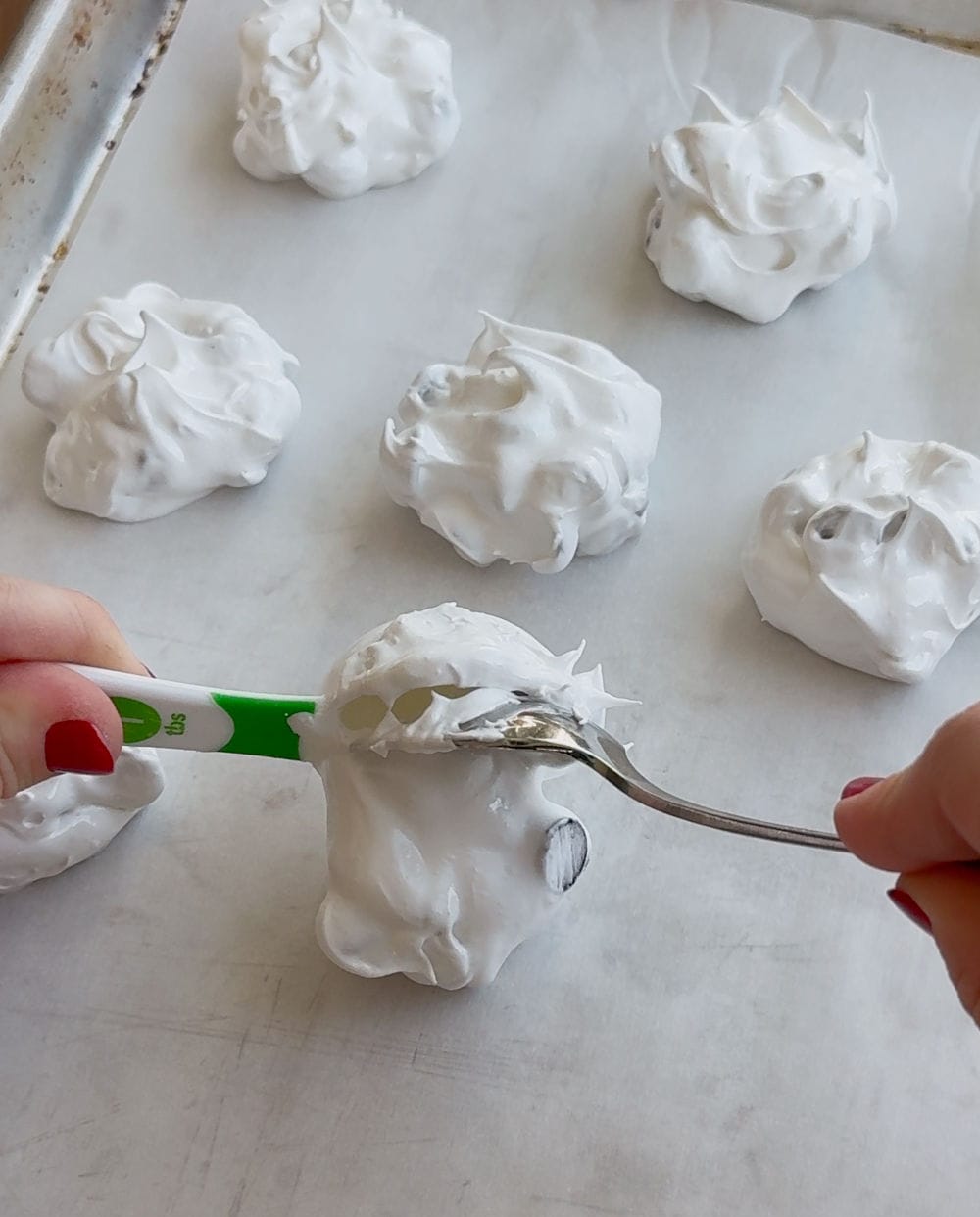 drop cookies onto cookie sheet with spoons.