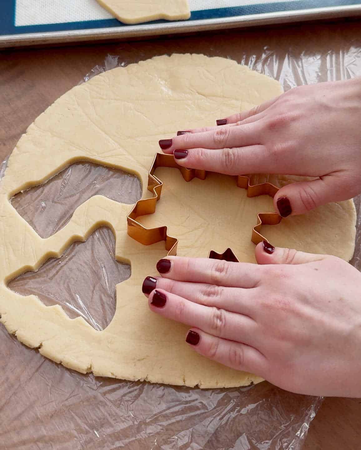 cut out shapes with cookie cutters.