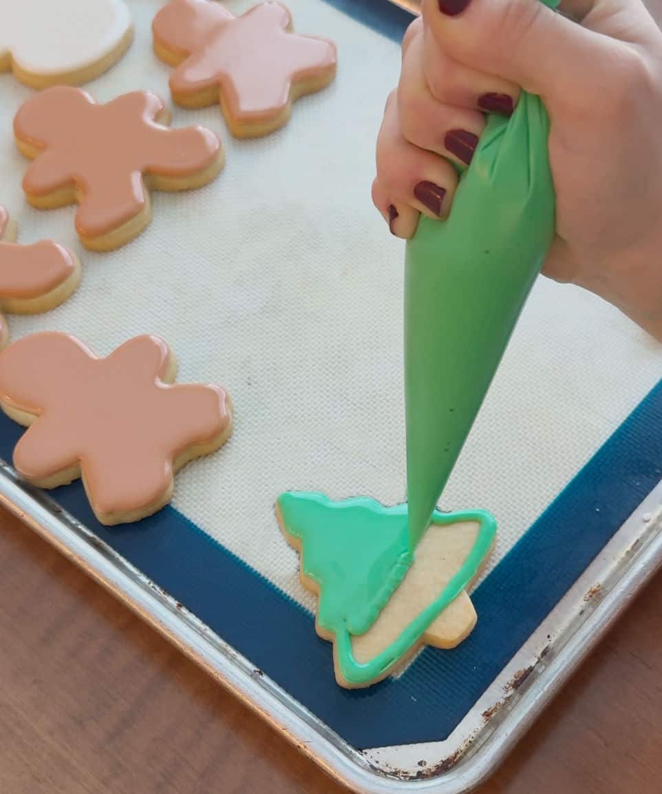 decorate cookies with icing.