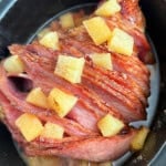 slow cooker ham with pineapple on top.