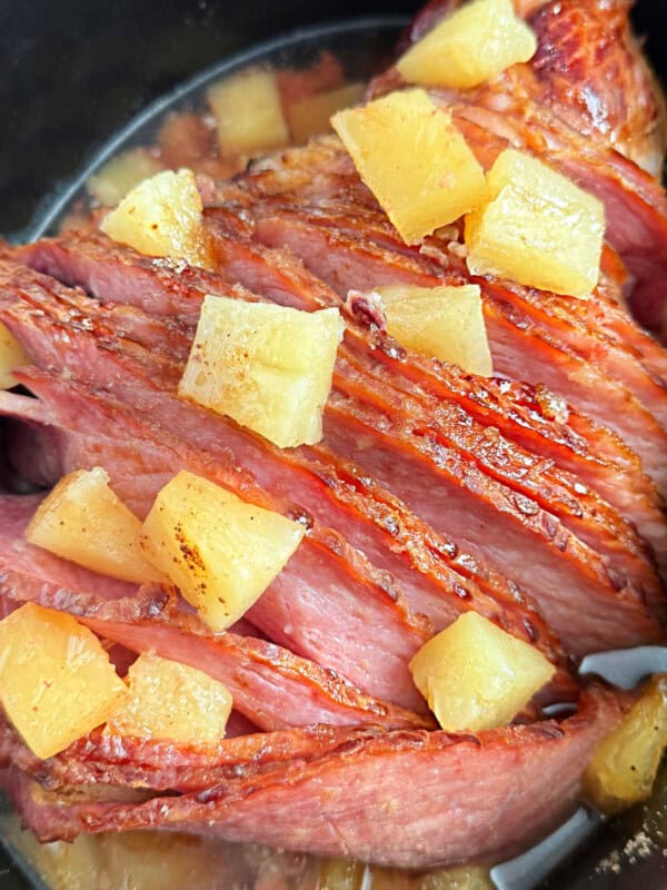 slow cooker ham with pineapple on top.