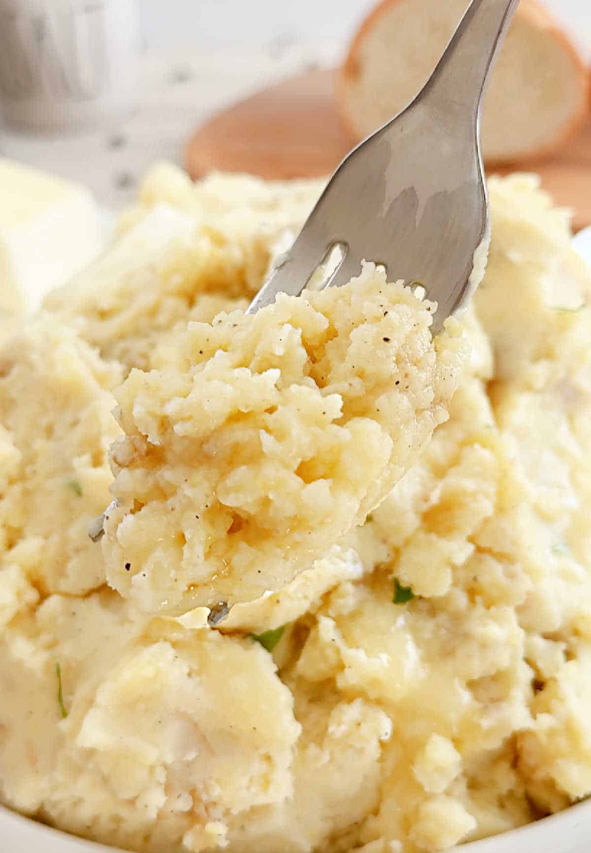 skin on mashed potatoes on fork.