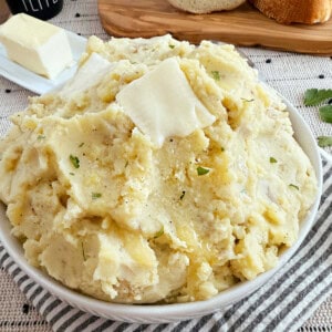 easy mashed potatoes with skin on in serving bowl.