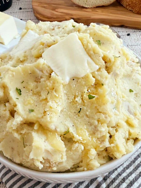 easy mashed potatoes with skin on in serving bowl.