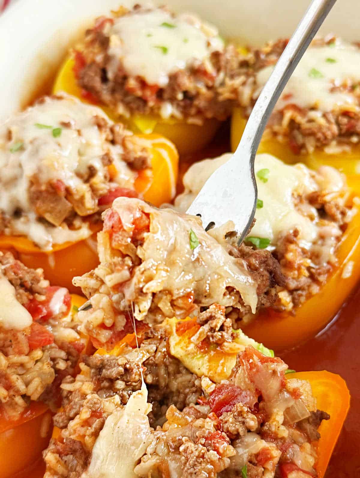 fork in baked stuffed bell peppers.