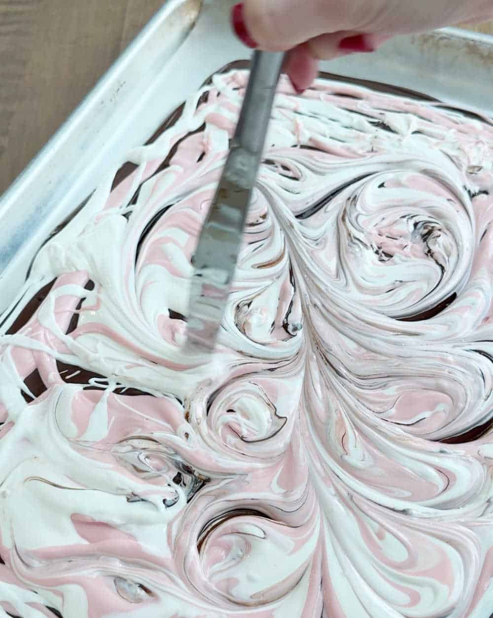 swirl layers with knife.