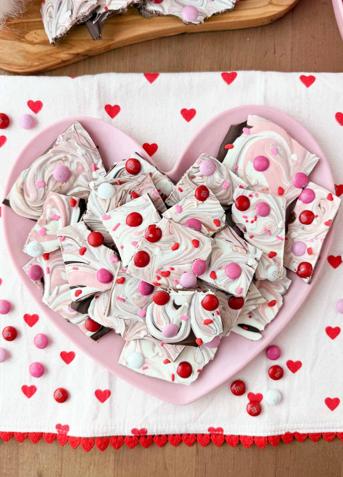 Pink and white Valentine's Day bark with M&M's.