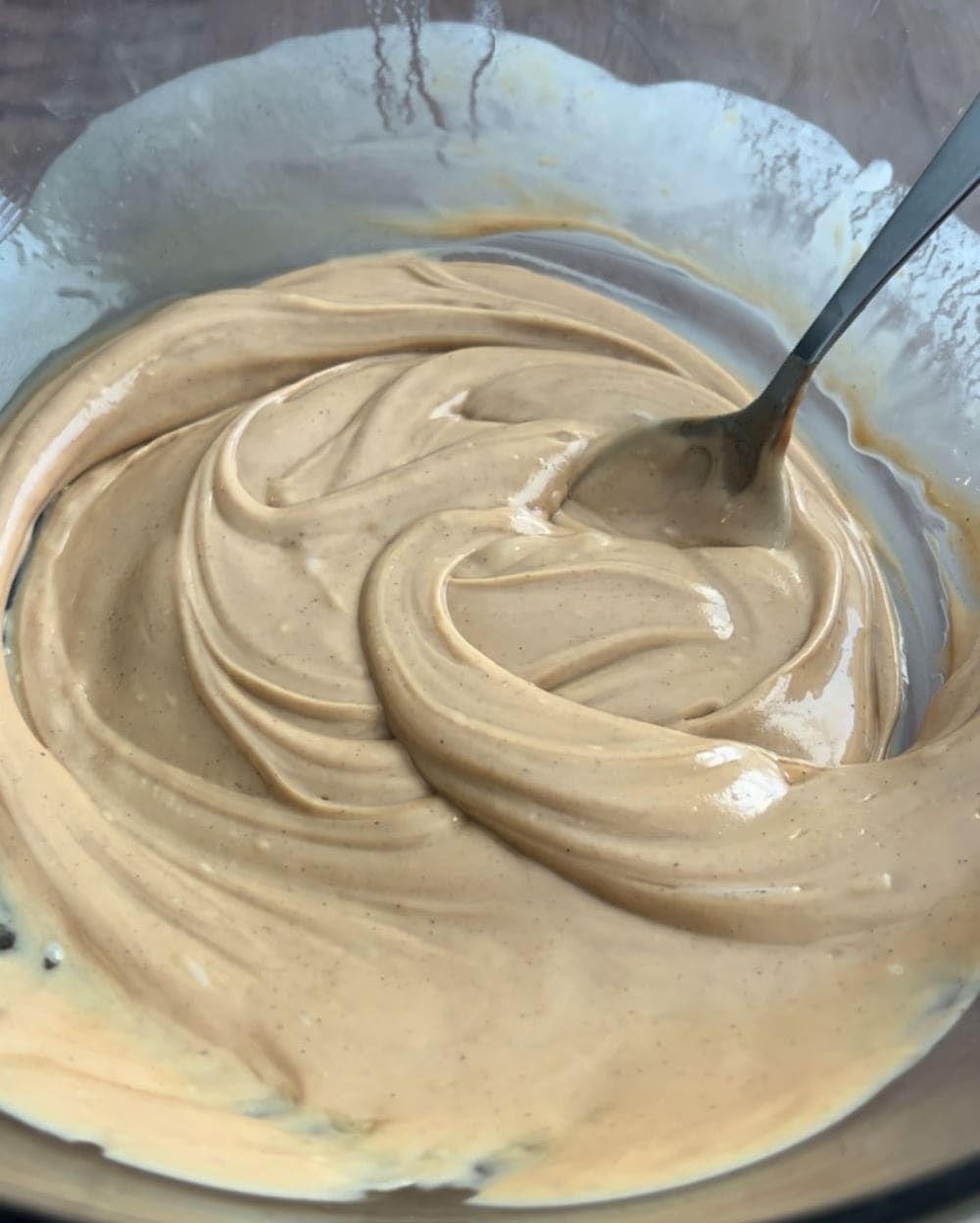 stir melted white chocolate and peanut butter.