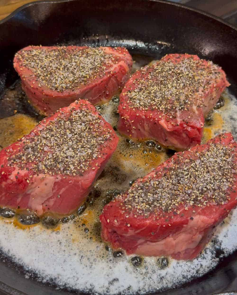 sear steaks in skillet.