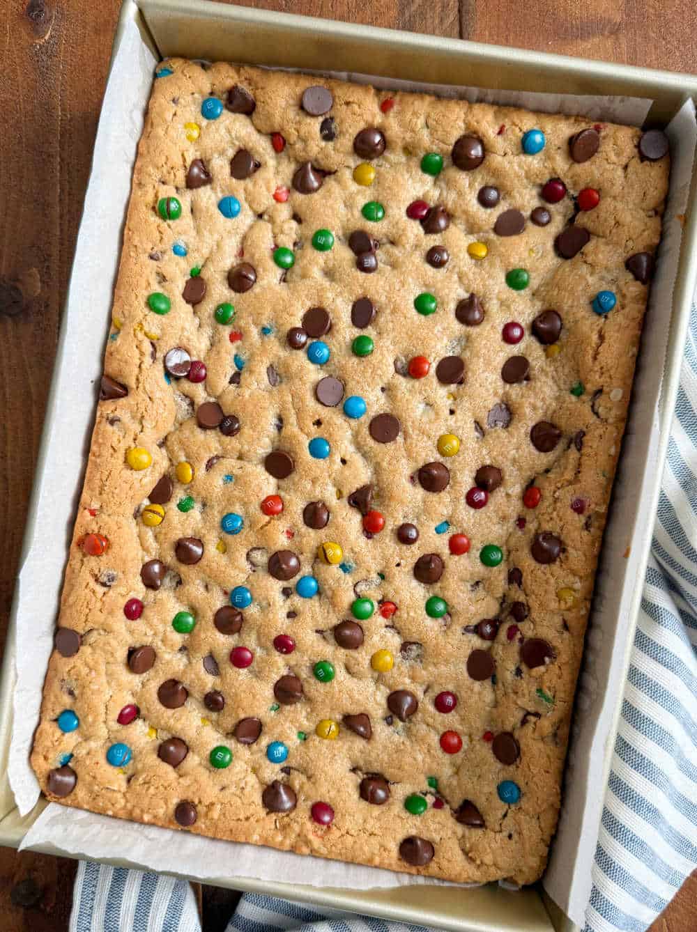 monster cookie bars in baking pan.