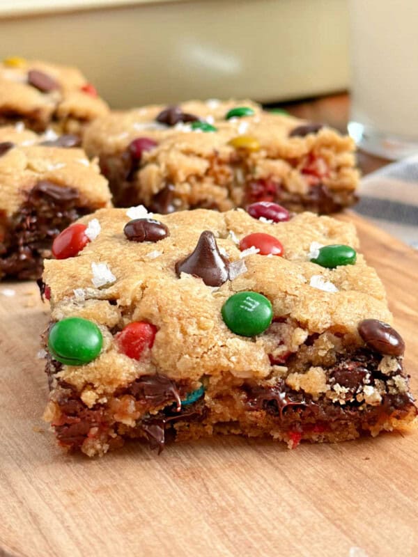 monster cookie bars with flaked salt and m&m candies.