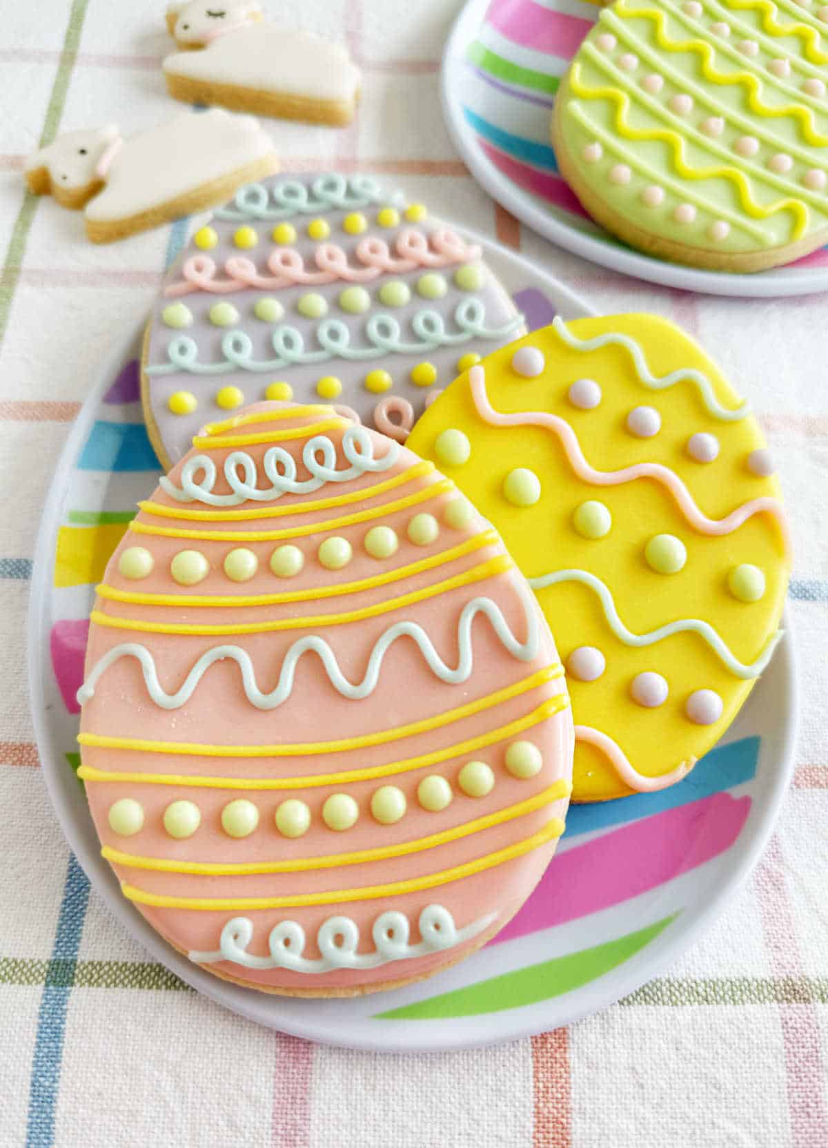 decorated Easter sugar cookies on plate.