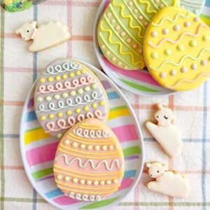 Easter cookies decorated as eggs and lambs.