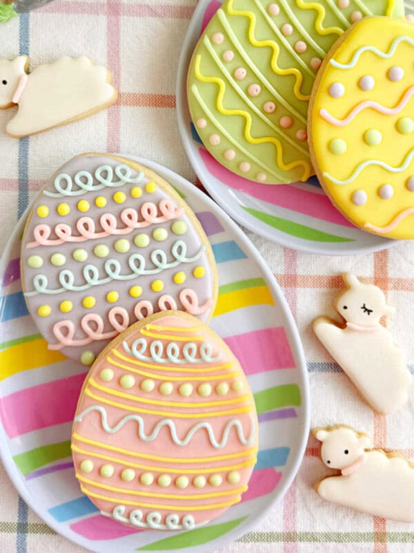 Easter cookies decorated as eggs and lambs.